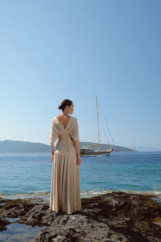 Long beige dress with waist ties