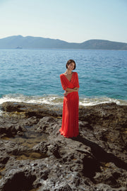 Long vibrant red dress with waist ties